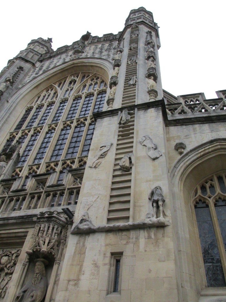 Angels climbing Bath Abbey. 