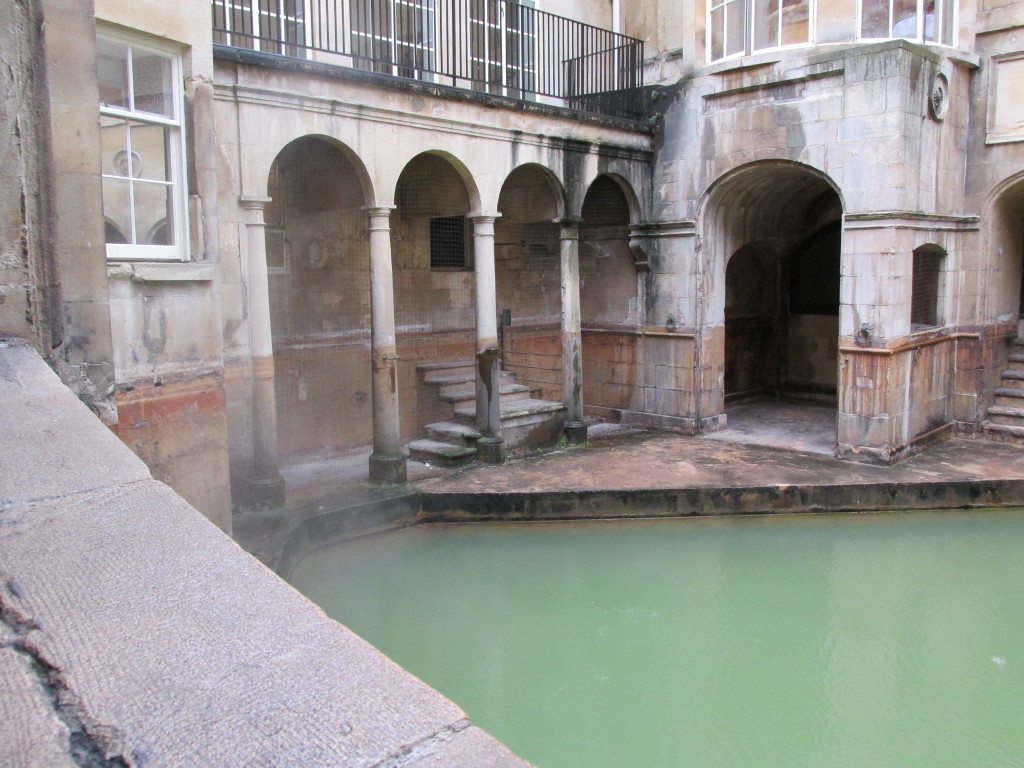 The Sacred Spring with steam rising off the surface of the water.